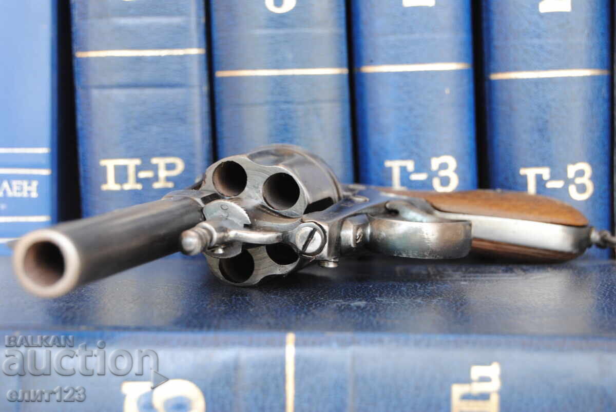 Auction  An old revolver