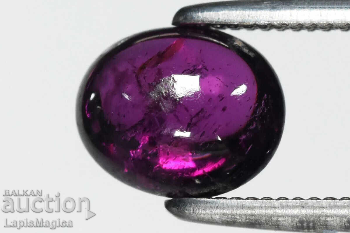 Естествен виолетов родолитов гранат 1.43ct овален кабошон