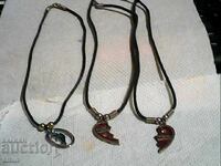 old necklaces with silver-plated charms
