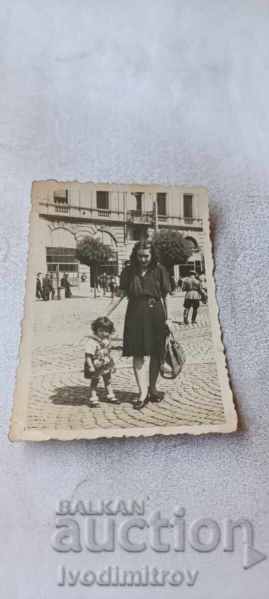 Photo Sofia Young woman and little boy on a walk