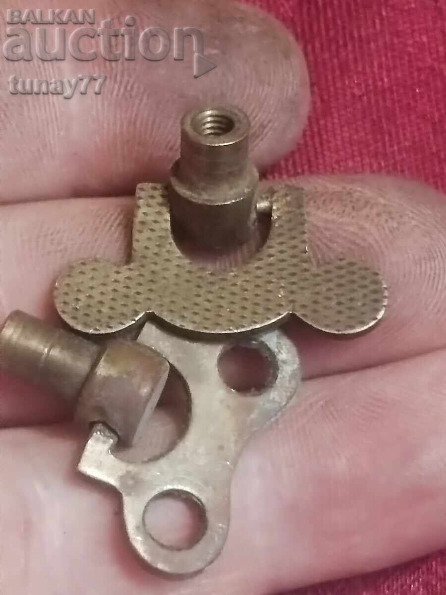 Auction  Old bronze clock winding keys