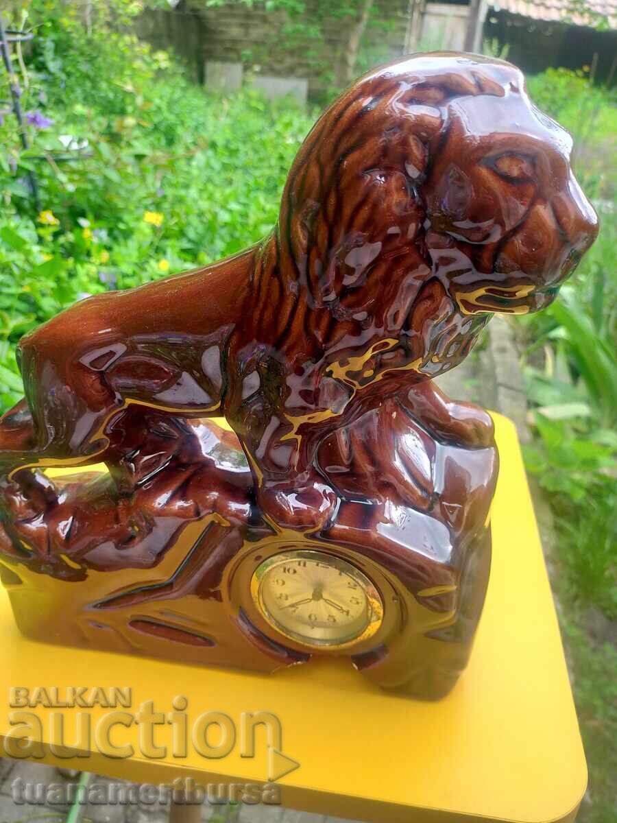 mechanical lion table clock