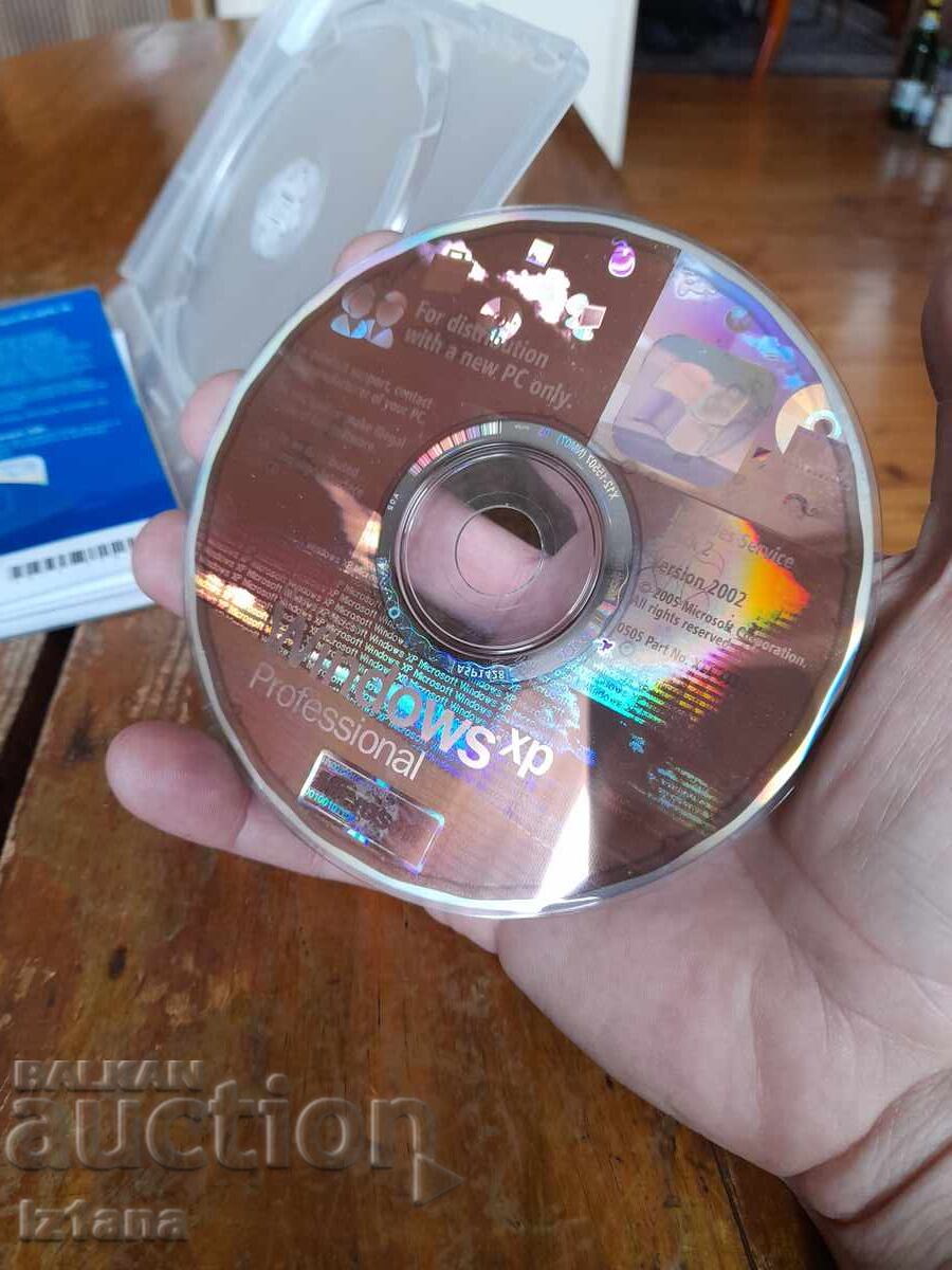 Livrarea CD Windows XP Profesional