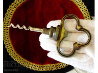 Bronze corkscrew with bottle opener, key