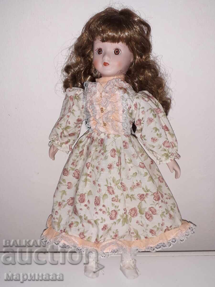 DOLL. PORCELAIN