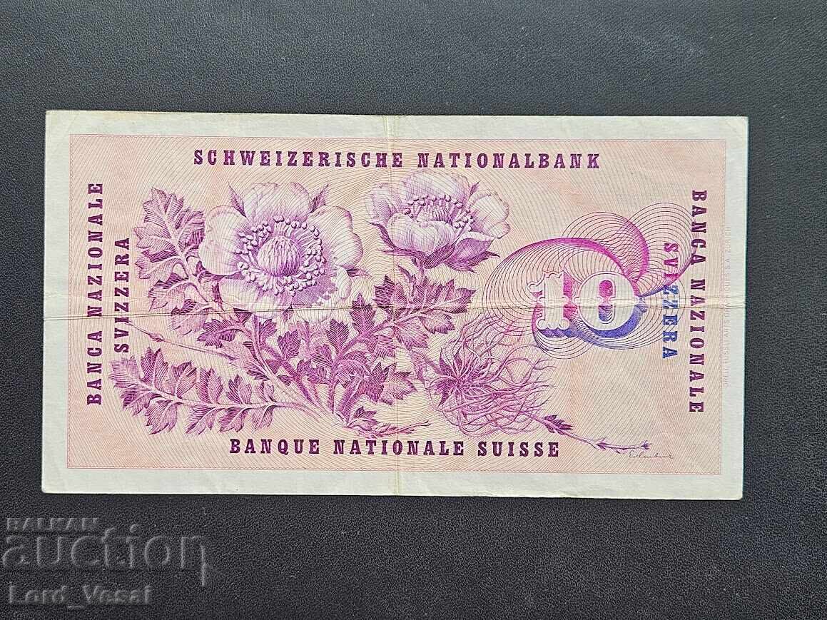 Elveția 10 Franci 1963 VF cu preț € 14.00 | 27.38 BGN