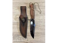 Hunting knife with leather sheath