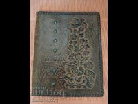 Leather folder richly decorated