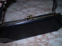 Black women's handbag is an elegant vintage model