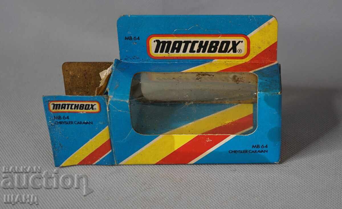 MATCHBOX CHRYSLER CARAVAN Cutie pentru mașinuță metalică MATCHBOX CHRYSLER CARAVAN Cutie pentru mașinuță metalică