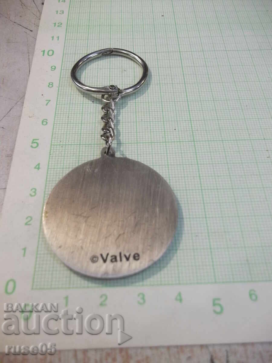 Delivery of "Cross" Keychain