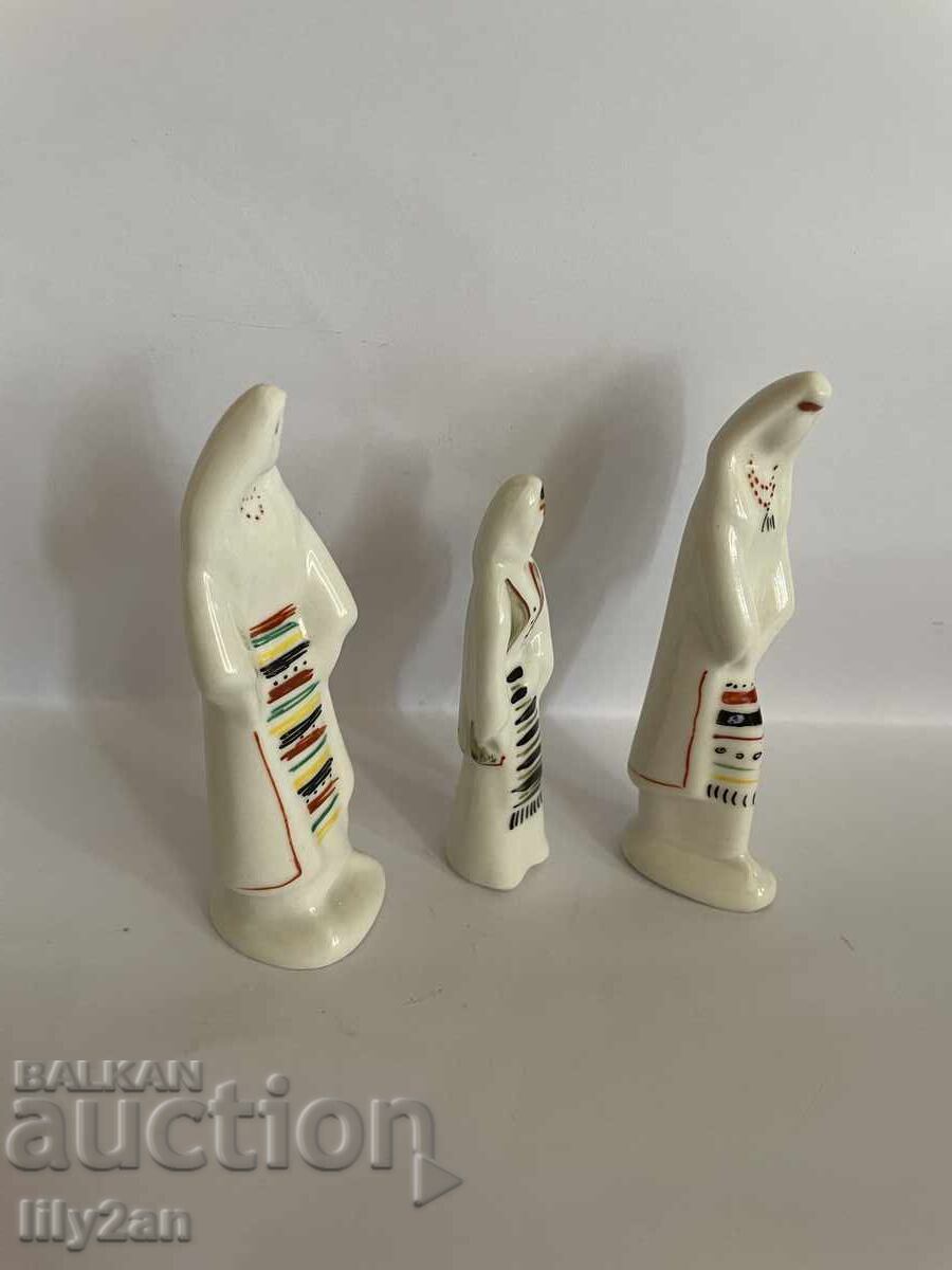 Auction  Porcelain dolls with a folklore motif