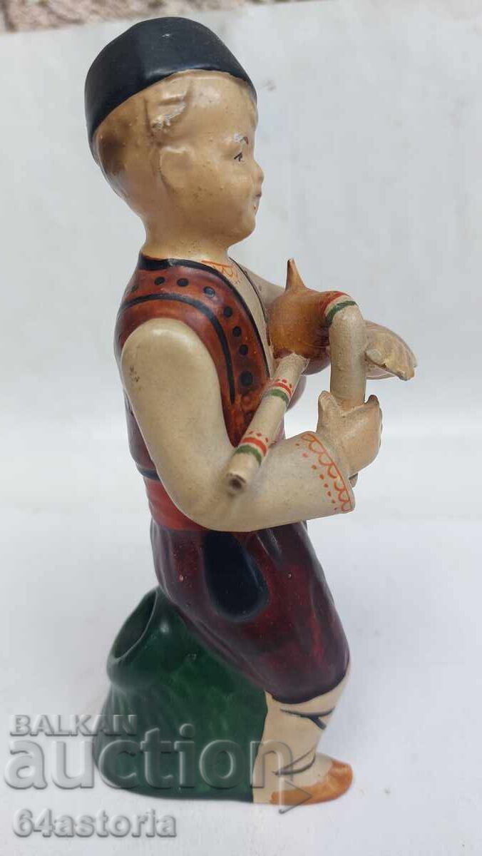Delivery of Ceramic figurine, bagpiper, folk costume, figure, Bulgarian Delivery of Ceramic figurine, bagpiper, folk costume, figure, Bulgarian