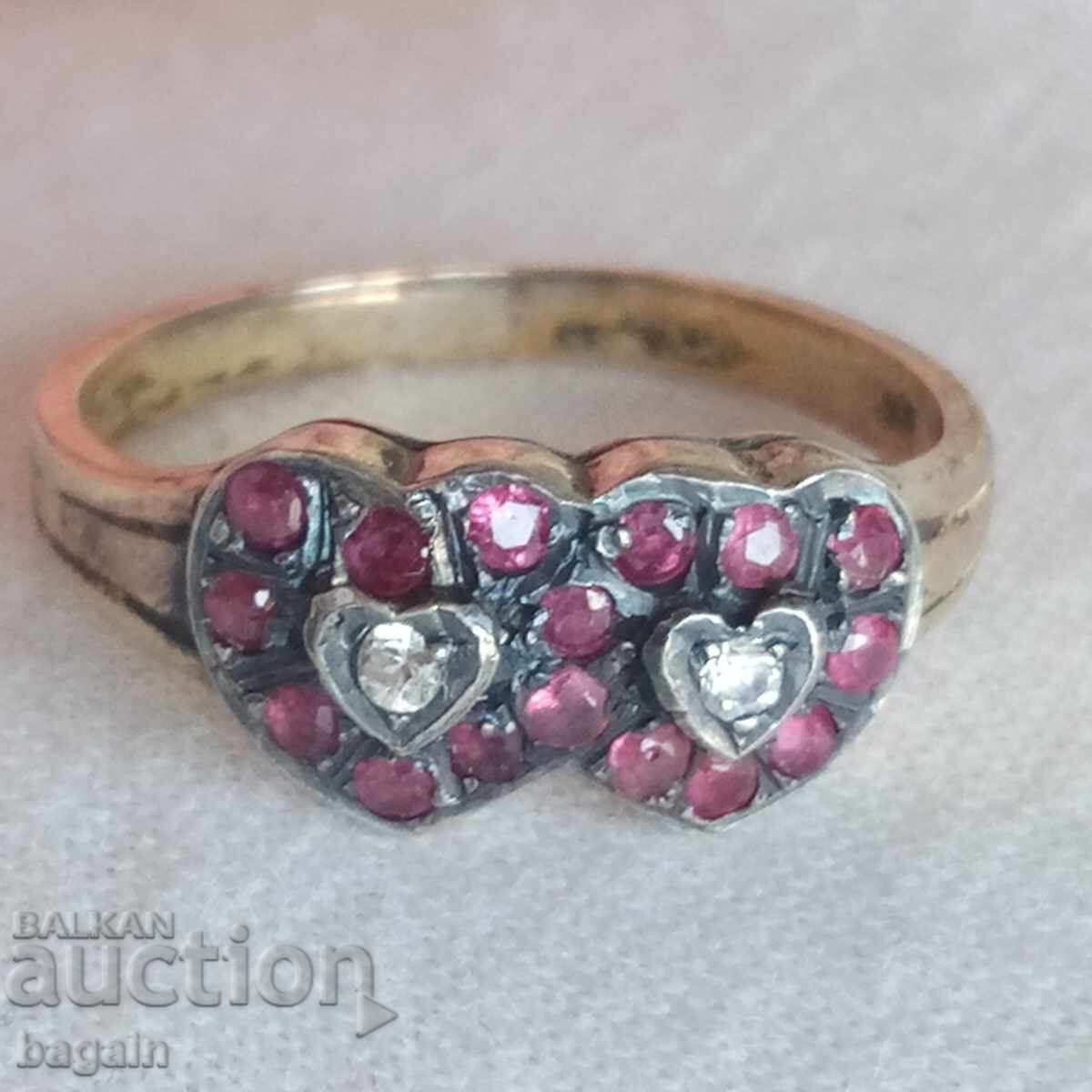 Silver ring with rubies and gold plating