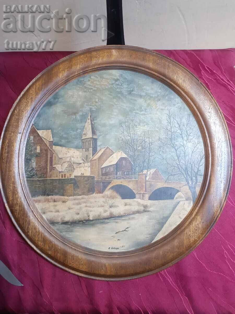The artwork is set in a massive, round wooden frame - 6