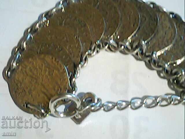 Auction  Beautiful bracelet with coins for luck