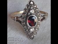Silver ring with garnet and gold plating