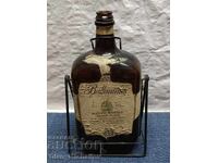 Old Whiskey Bottle with Cradle