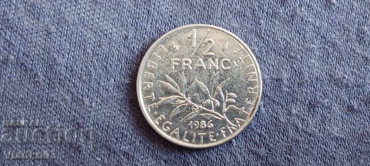 Franța 1/2 franc 1986