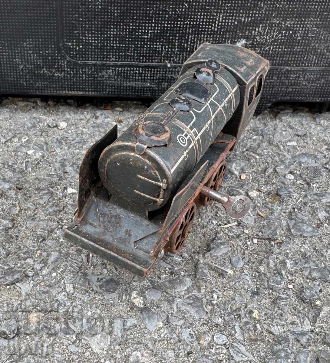Jucărie mecanică veche germană din metal, tren, locomotivă cu preț € 17.00 | 33.25 BGN