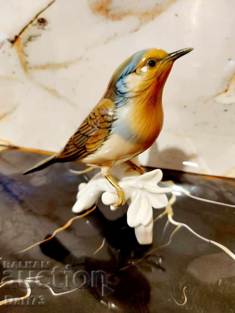 Statuetă elegantă din porțelan reprezentând o pasăre