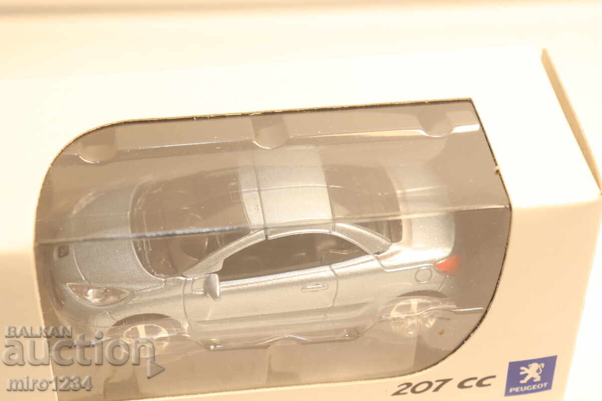 Licitație MAȘINUȚĂ JUCĂRIE MODEL NOREV PEUGEOT 207 CC 1/64