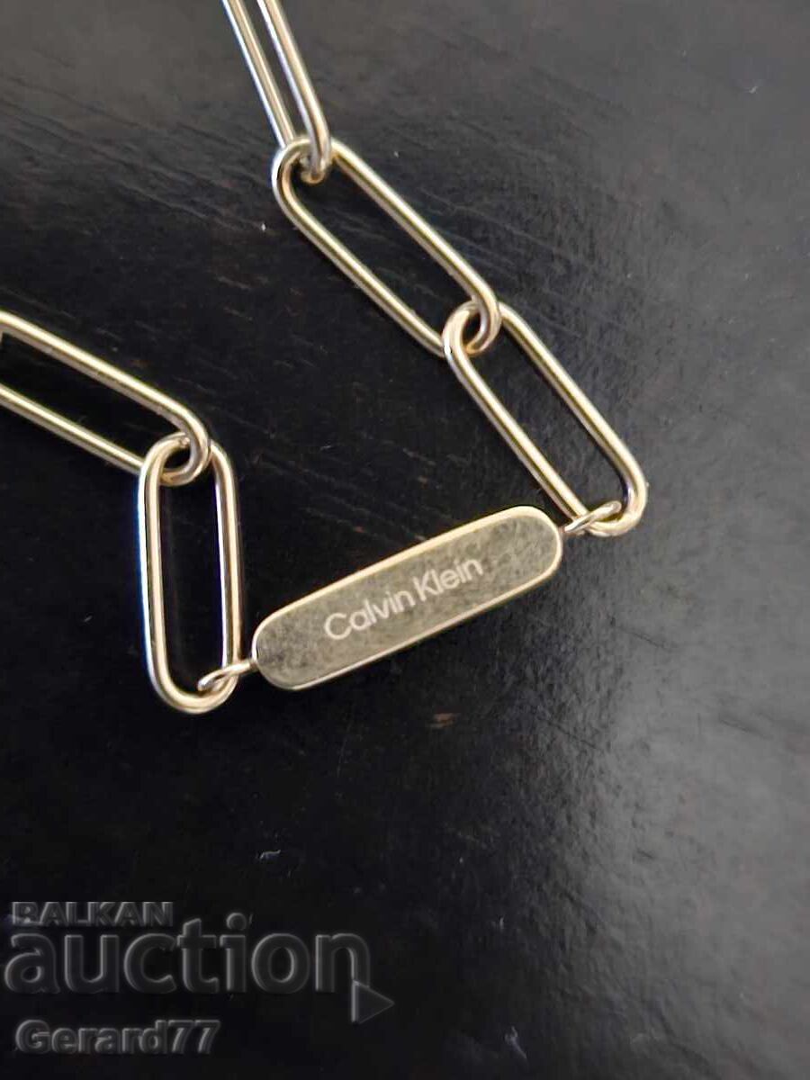 Позлатено колие, Calvin Klein