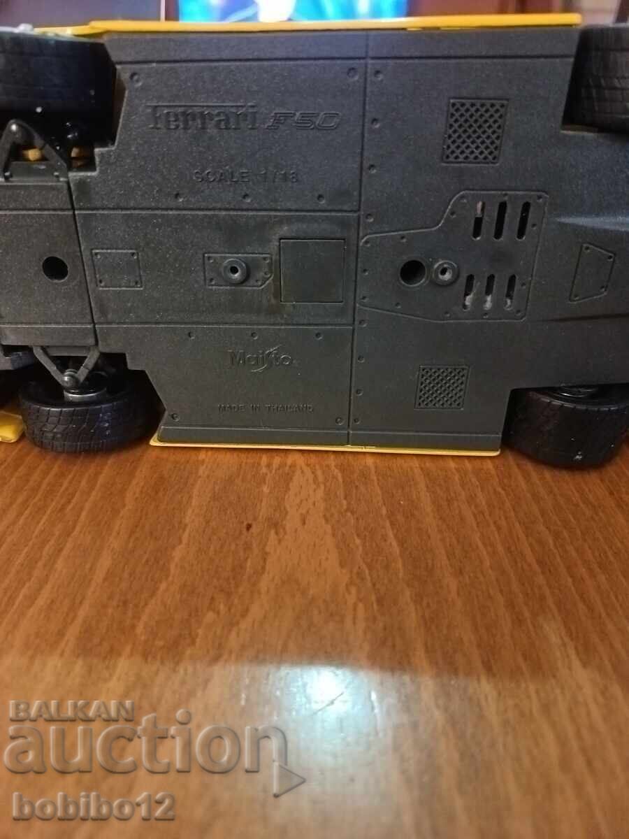Licitație Mașinuță Vintage Maisto 1:18 Ferrari F50 galbenă Licitație Mașinuță Vintage Maisto 1:18 Ferrari F50 galbenă