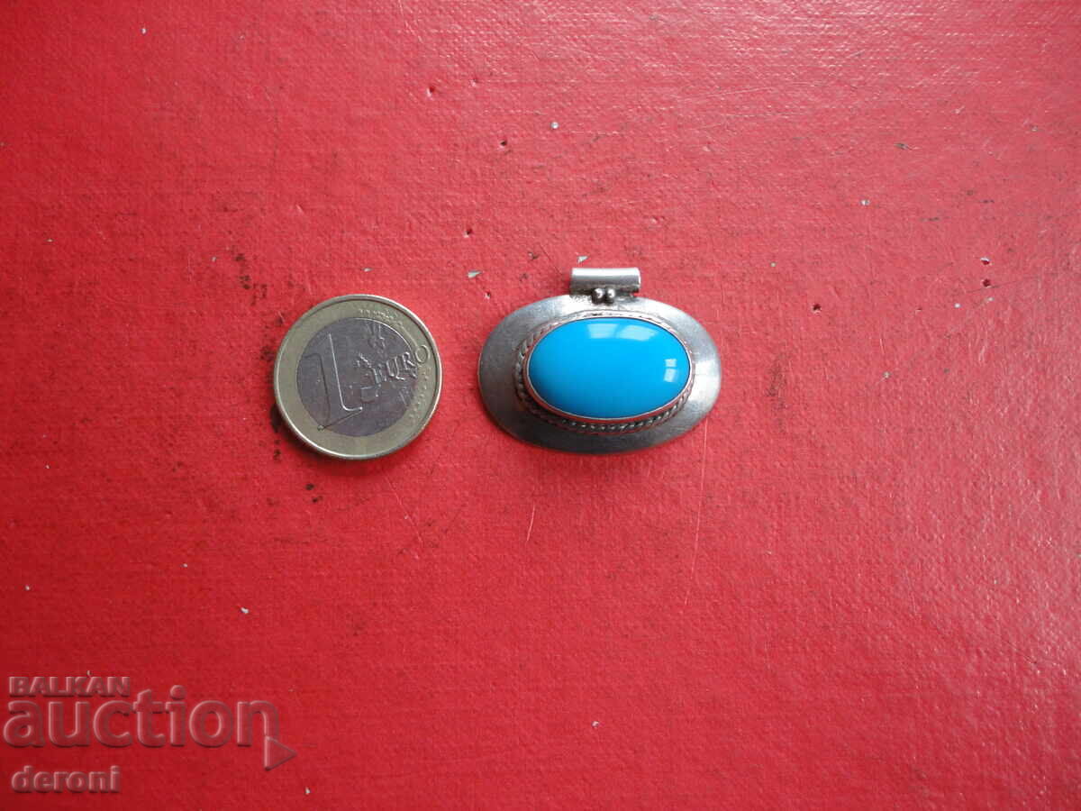 Silver pendant with turquoise