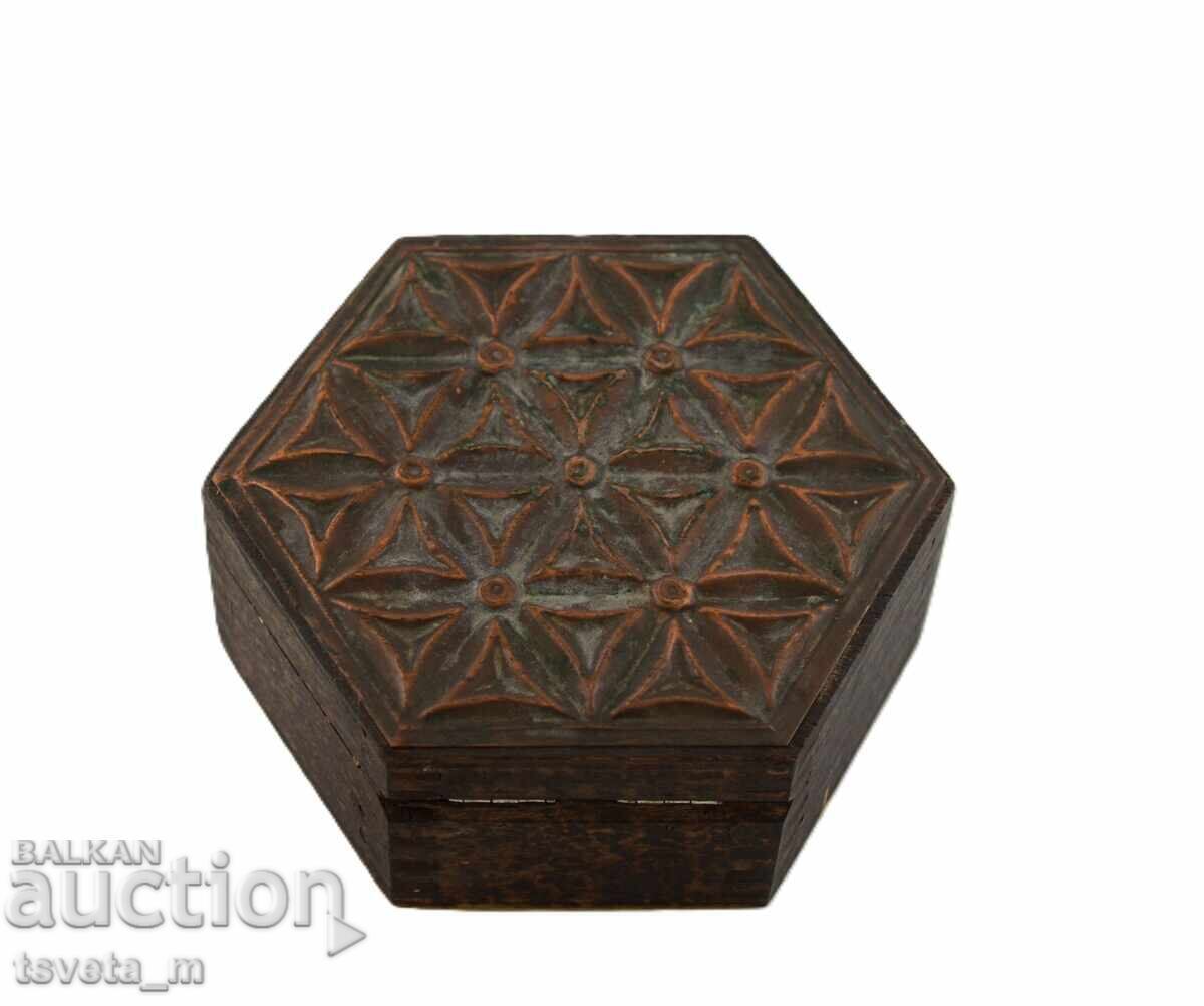 Delivery of Wooden box with ornamentation of wrought copper