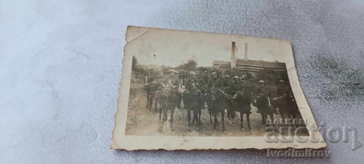 Photo: Cavalrymen on the road