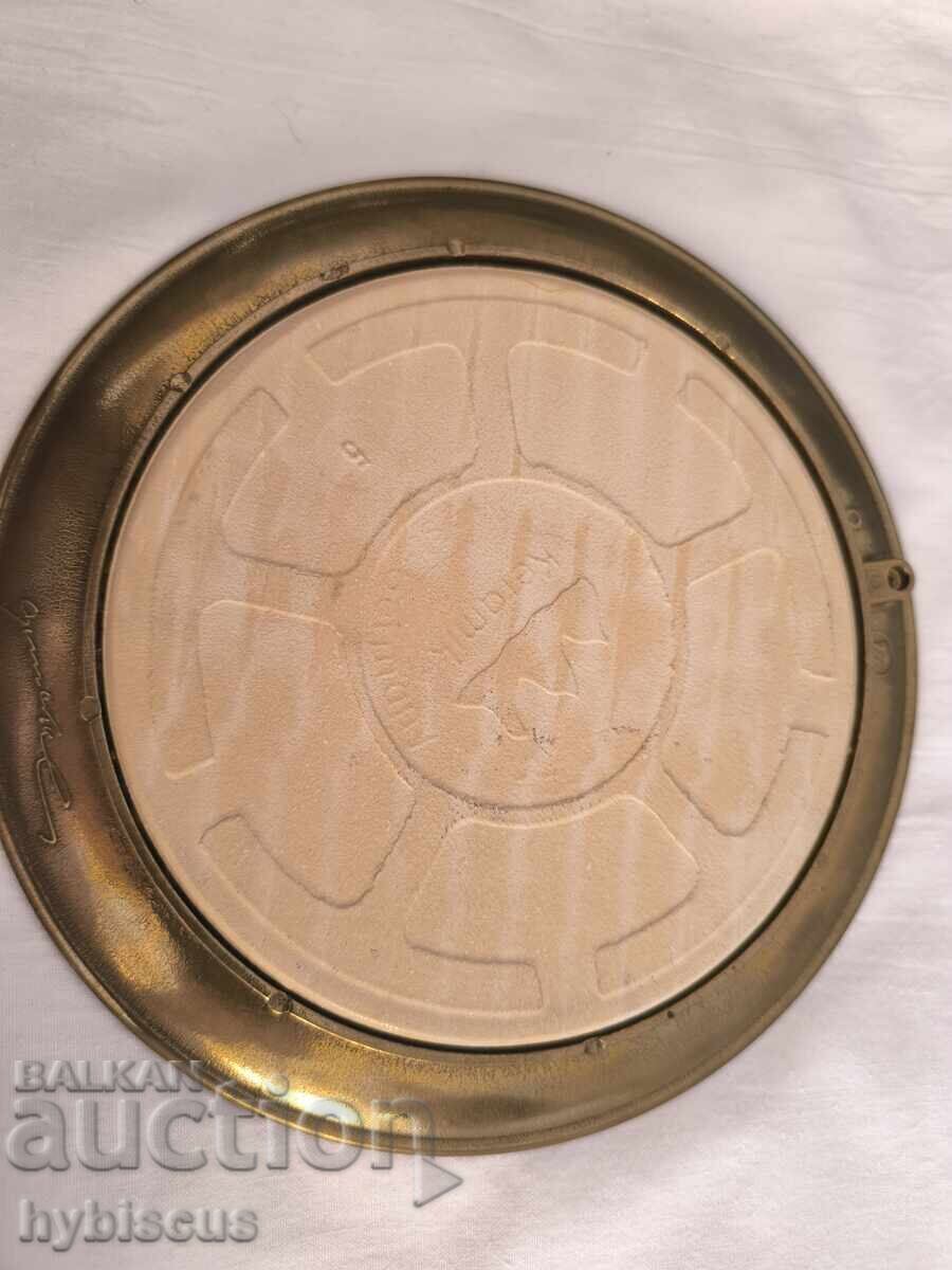 Auction  Decorative German ceramic wall plate with bronze