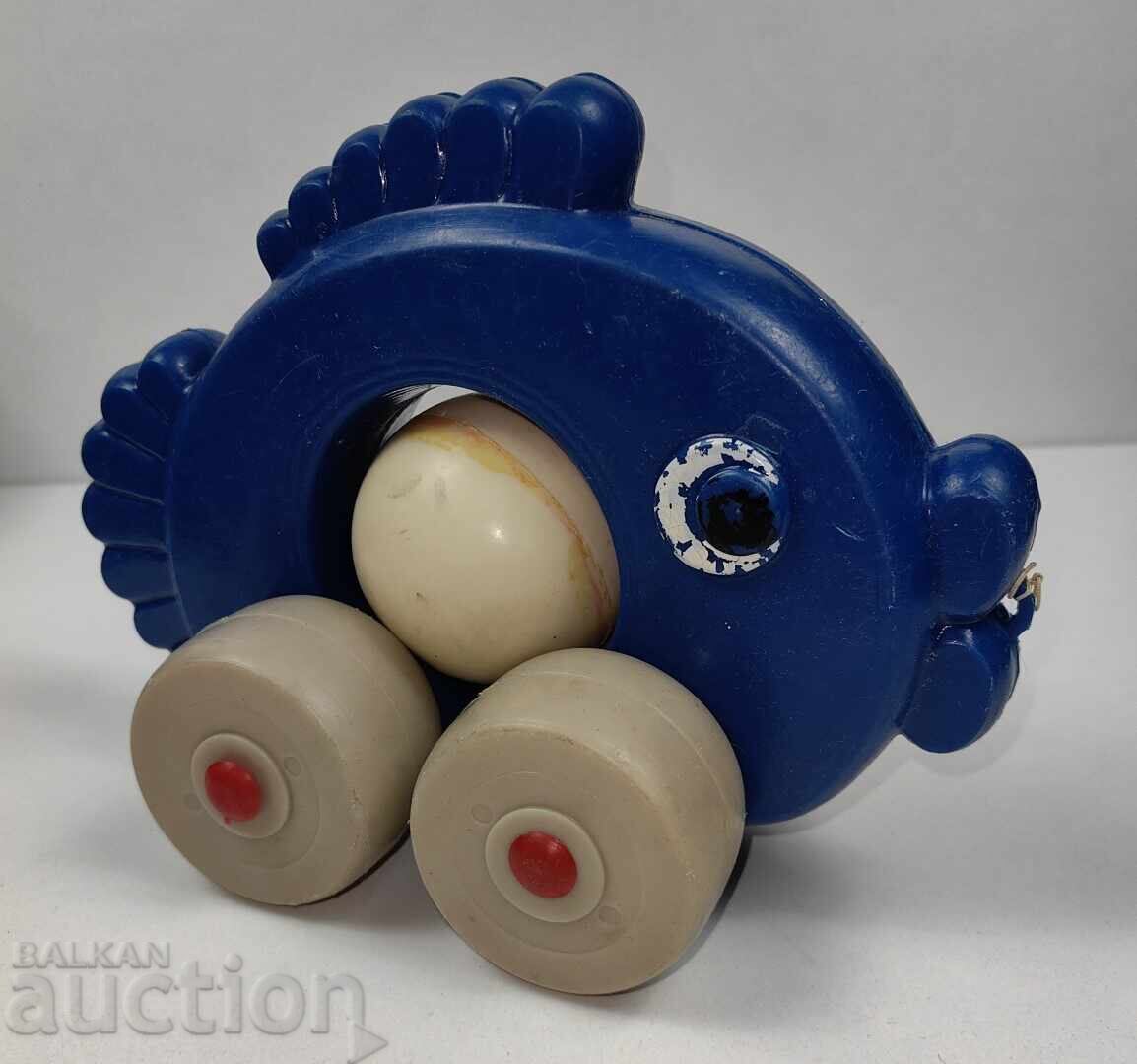 SOCIALIST PLASTIC PULL-ALONG TOY FISH