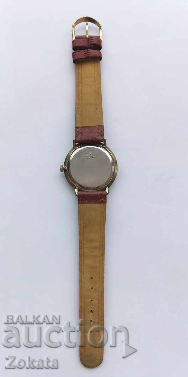 Delivery of Gold-plated watch. Creation Swiss Mabe. Works Delivery of Gold-plated watch. Creation Swiss Mabe. Works
