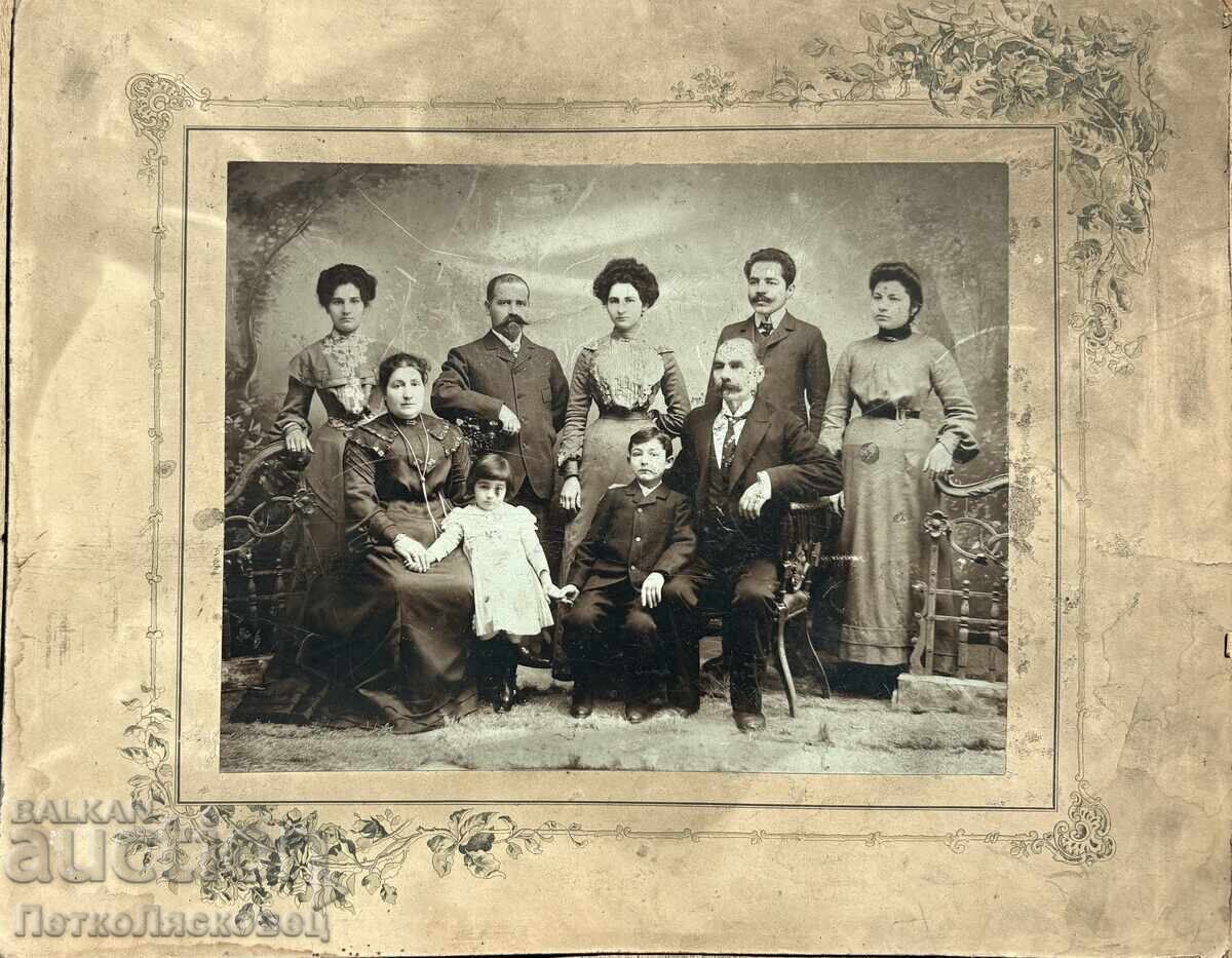 Old cardboard photograph of the Kutinchev family Old cardboard photograph of the Kutinchev family