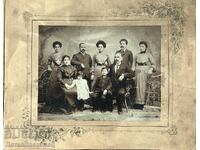 Old cardboard photograph of the Kutinchev family