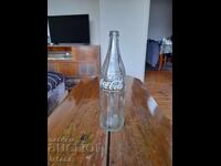 Ένα παλιό μπουκάλι Coca Cola, Coca Cola