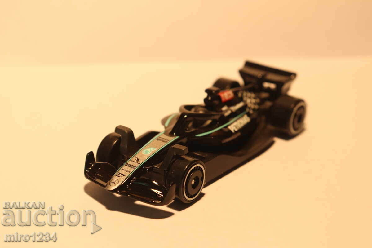 Licitație MODEL 1/64 HOT WHEELS MERCEDES BOLID FORMULA 1 PETRONAS