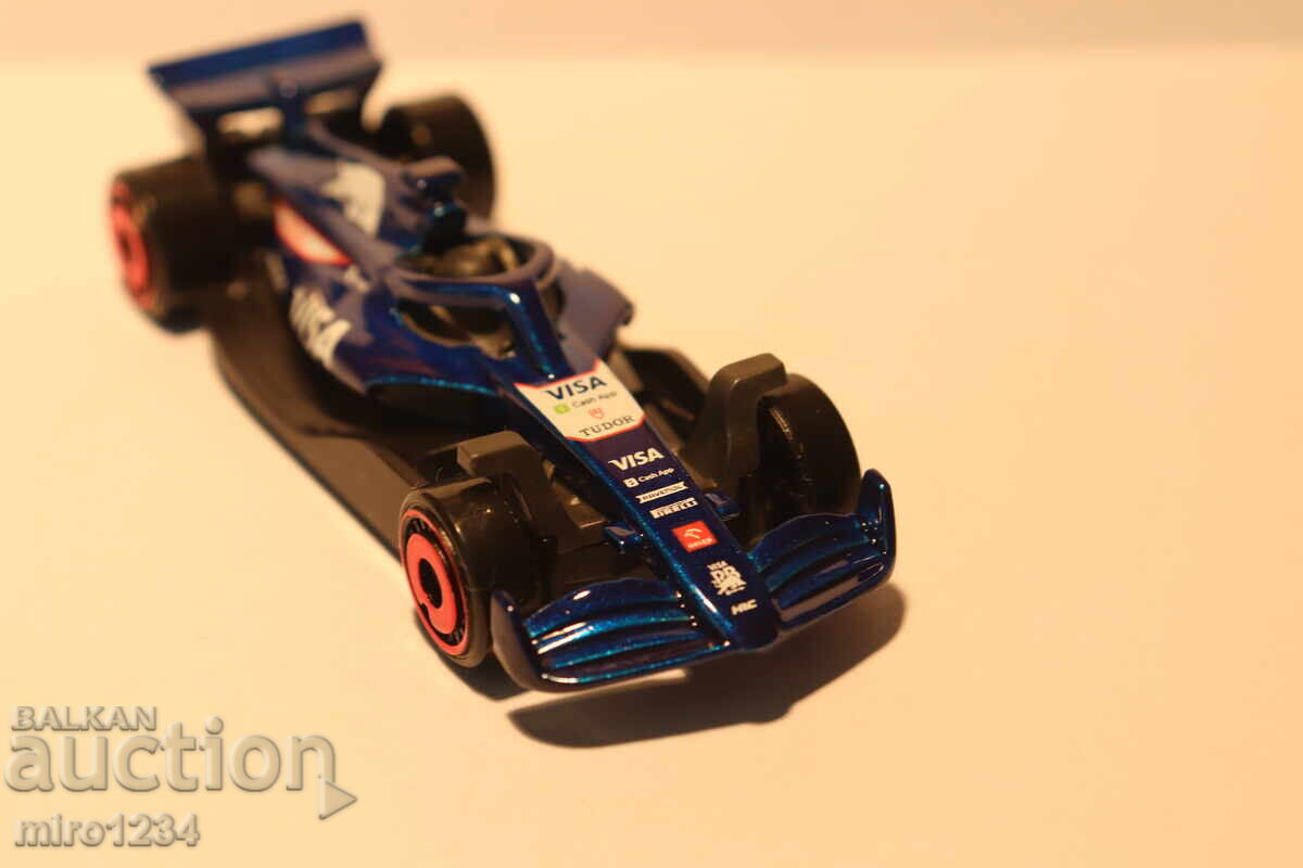 Аукцион 1/64  HOT WHEELS  HONDA  БОЛИД ФОРМУЛА 1 RED BULL VISA МОДЕЛ