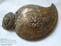 Huge silver half of a pafta