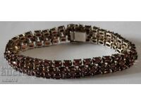 Silver bracelet with garnet