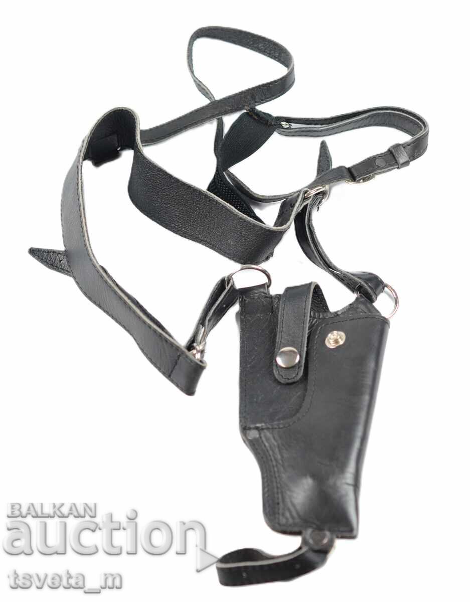 Black leather shoulder holster for pistol
