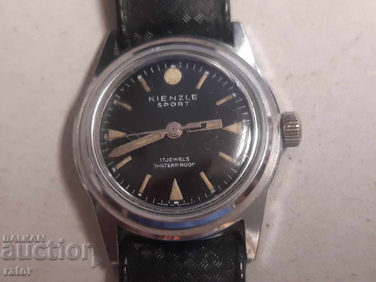 Auction  KIENZLE wristwatch with a Swiss strap