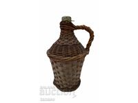 Damigeană veche anii 1950 – sticlă + ratan – 5 litri – 32 cm