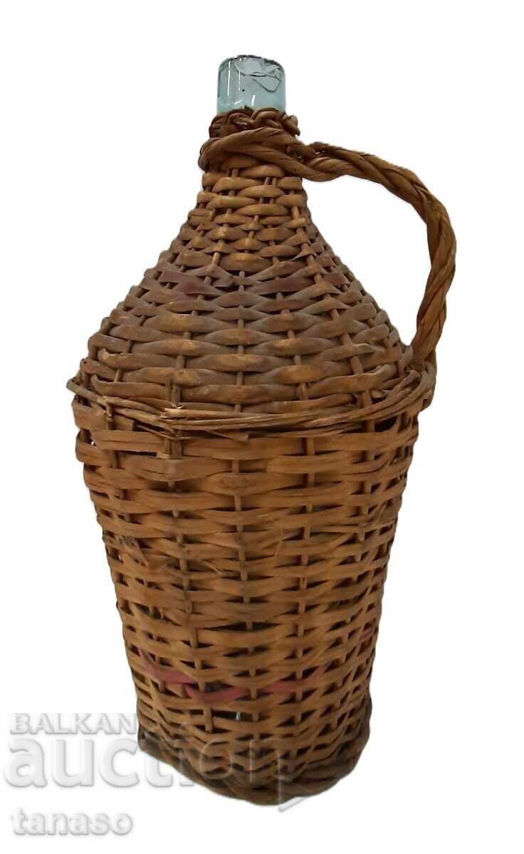 Damigeană veche 1940–1950 sticlă și ratan 5 litri