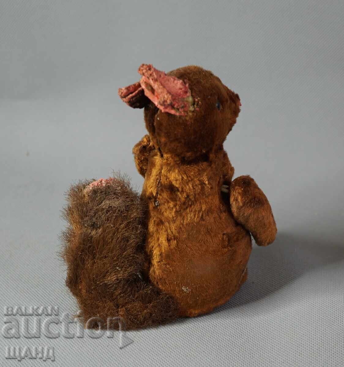 Auction  Vintage mechanical toy figure squirrel doll