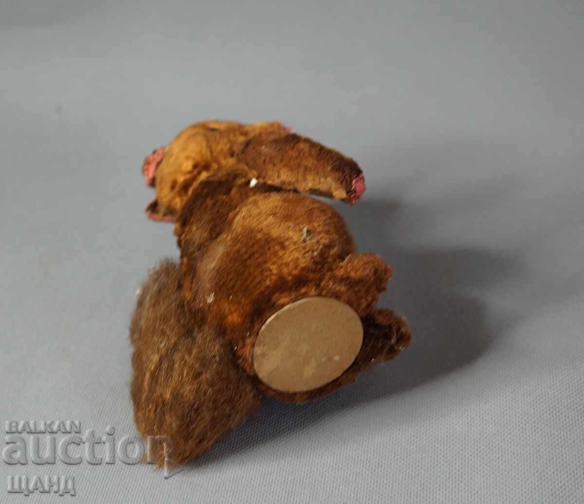Delivery of Vintage mechanical toy figure squirrel doll