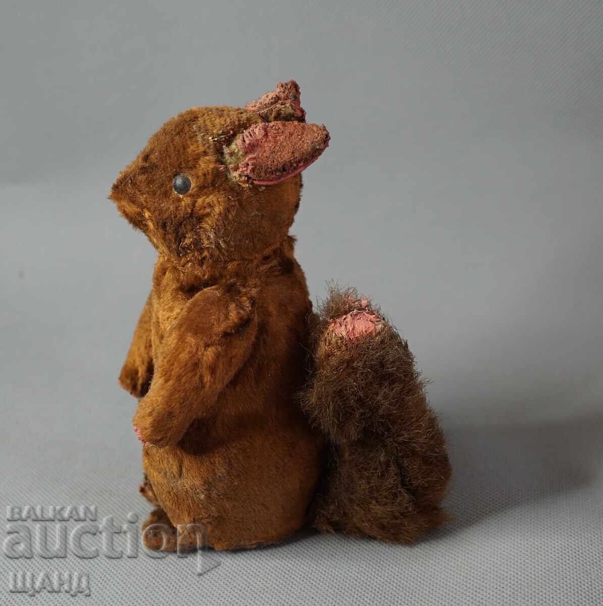 Vintage mechanical toy figure squirrel doll