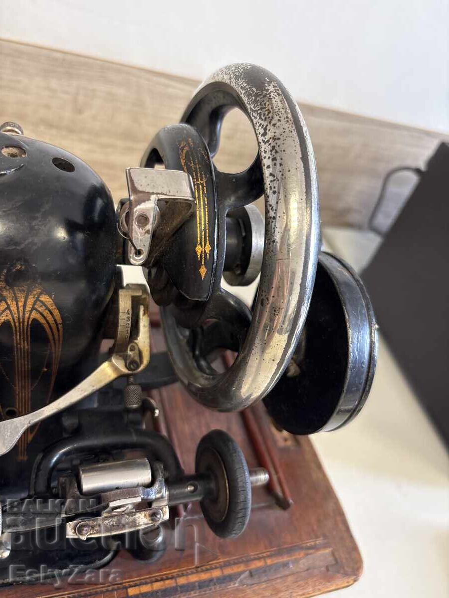Delivery of German antique sewing machine, Phoenix brand