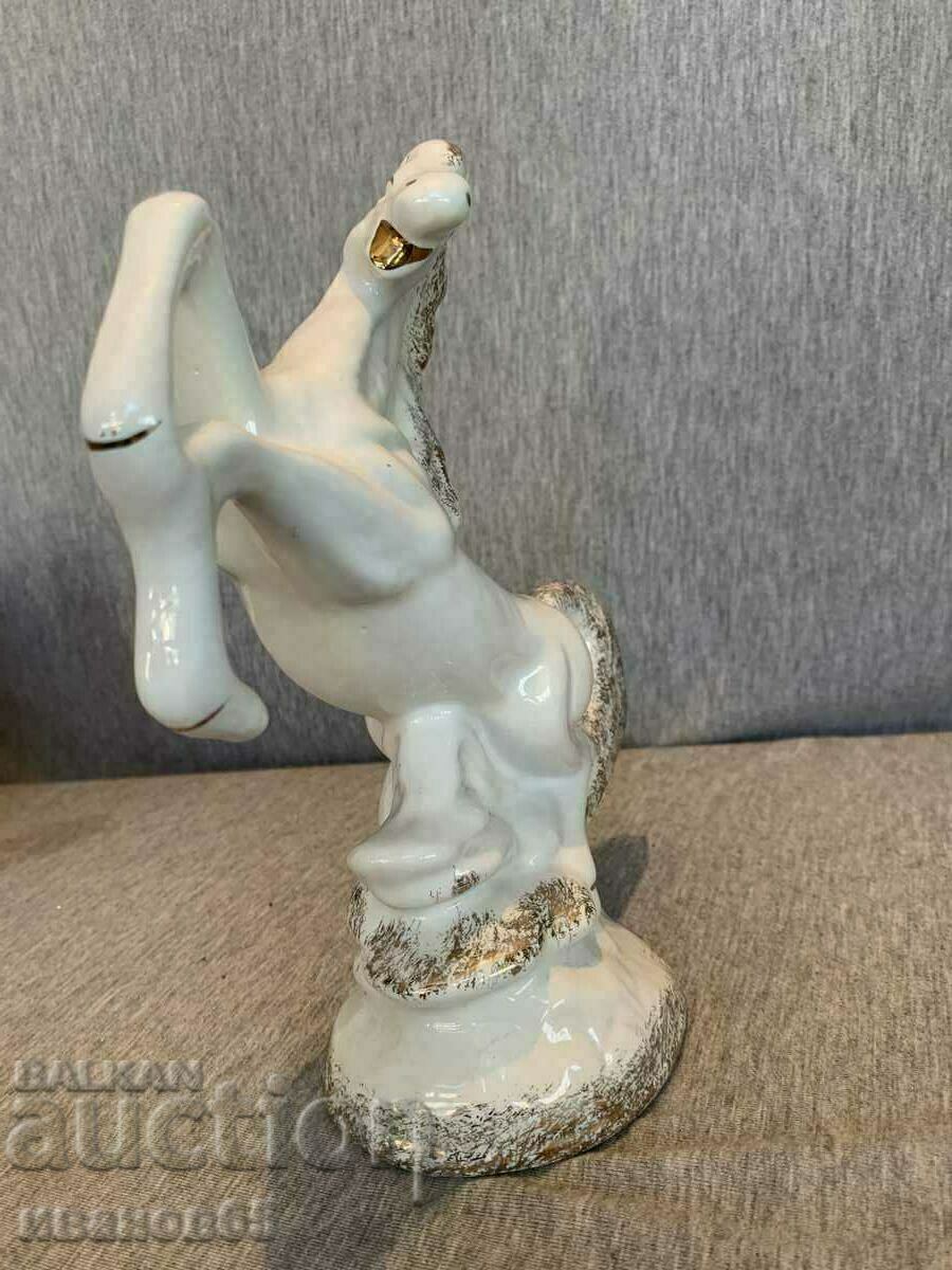 Auction porcelain figure Auction porcelain figure